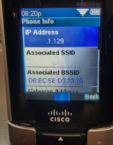 Picture of the Cisco WIP310 cordless phone in the Phone Info screen, showing an IP address which has been partially obfuscated